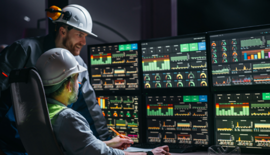 engineers with screens